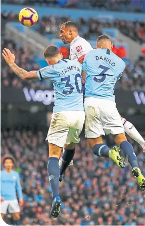  ??  ?? The Cerries’ Callum Wilson rises highest to head home the equaliser