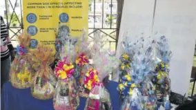  ?? ?? Gift baskets on display before being distribute­d to individual­s who turned up yesterday to be vaccinated in Mandeville.