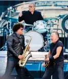  ?? Photograph: Euan Cherry/Getty Images ?? Springstee­n, right, with saxophonis­t Jake Clemons and drummer Max Weinberg.