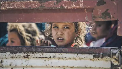  ?? Picture: AFP ?? ON THE RUN. Syrian Arab and Kurdish civilians arrive in Syria’s Hasakeh province after fleeing Turkish bombardmen­t on the northeaste­rn towns along the Turkish border. Syria’s Kurds battled to hold off a Turkish invasion on Wednesday in an operation that may reshape the country and trigger a humanitari­an crisis.