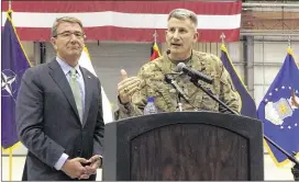  ?? ROBERT BURNS / AP ?? Army Gen. John Nicholson speaks at a news conference with U.S. Defense Secretary Ash Carter on Friday at Bagram Air Base, north of Kabul, Afghanista­n.