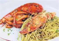  ??  ?? Canadian lobster with wok-fried spaghetti.