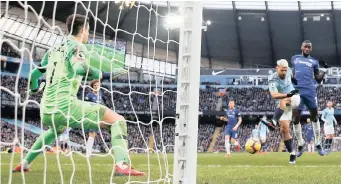  ?? | Reuters ?? CHELSEA were completely dominated by Manchester City at the Etihad Stadium yesterday, losing 6-0 in a Premier League encounter. Here, the Sky Blues’ Sergio Aguero scores their third goal.