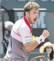  ?? Dominique Faget AFP/Getty Images ?? STAN WAWRINKA, who ousted the No. 1 and No. 2 seeds in his title run, reacts during the four-set final.