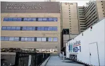  ?? ALYSSA POINTER / ALYSSA.POINTER@AJC.COM ?? The mobile unit at Grady Memorial Hospital, officially­called Atrium Health’s Carolinas MED-1, worked out well enough that Grady was glad to bring it back. The Grady ER is usually near capacity, and flu season tips it over.