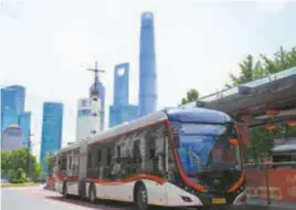  ?? — Xinhua ?? Bus No. 71, running from the Bund, was among the first more than 270 bus lines to restart operations yesterday.