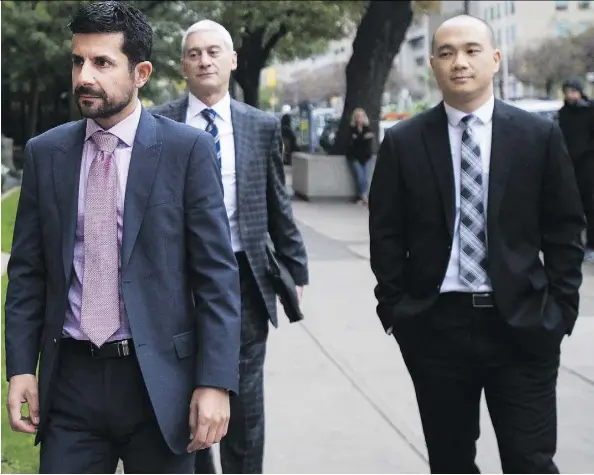  ?? NATHAN DENETTE/THE CANADIAN PRESS ?? Sears officials, from left, Daniel Westreich, senior corporate counsel, Philip Mohtadi, general counsel, and Billy Wong, chief financial officer, arrive in court Friday. The court granted the liquidatio­n bid after no viable proposal to save the...