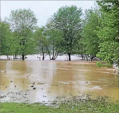  ?? SUBMITTED PHOTO – COCHRANVIL­LE FIRE COMPANY ?? Flooding in West Fallowfiel­d Thursday morning.