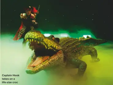  ??  ?? Captain hook takes on a life-size croc