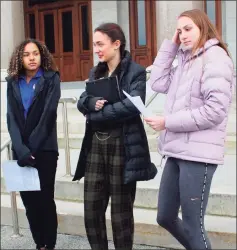  ?? Associated Press file photo ?? In this Feb. 12 photo, high school track athletes Alanna Smith, left, Selina Soule, center, and Chelsea Mitchell prepare to speak at a news conference outside the state Capitol in Hartford.