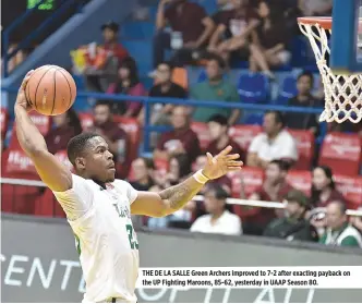  ?? ALVIN S. GO ?? THE DE LA SALLE Green Archers improved to 7-2 after exacting payback on the UP Fighting Maroons, 85-62, yesterday in UAAP Season 80.