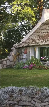  ??  ?? ABOVE The mushroom-like Half House by Michigan architect Earl Young, built in 1947, is a late example built almost entirely of granite boulders and local fieldstone.