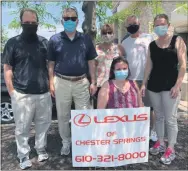  ?? SUBMITTED PHOTO ?? Employees at Lexus of Chester Springs, one of the sponsors of Bournelyf Special Camp’s 10th annual Handto-Hand 5K, kicked off the virtual race, which raised over $11,000 for the West Chester non-profit.