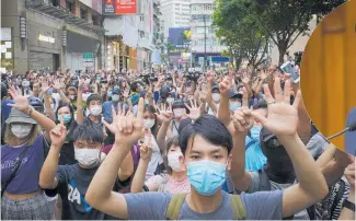  ?? Photo / AP ?? Protesters demand freedom in Hong Kong — just one of the flashpoint­s in the increasing­ly tense relationsh­ip between China and Western nations.