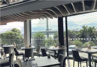  ??  ?? New floor-to-ceiling windows in the restaurant offer panoramic views of the Forth bridges.