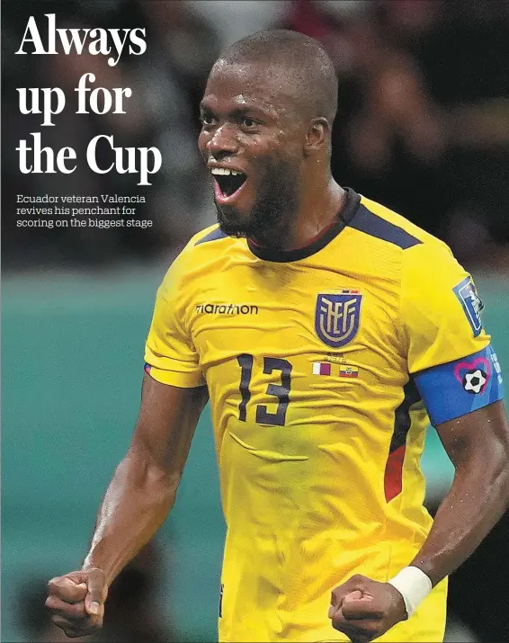  ?? AP ?? Enner Valencia celebrates scoring his second goal in Ecuador’s 2-0 World Cup Group A victory over Qatar at Al Bayt Stadium in Al Khor on Nov 20. The 33-year-old former West Ham forward is only the fourth player to score six goals in consecutiv­e matches in the tournament’s history.