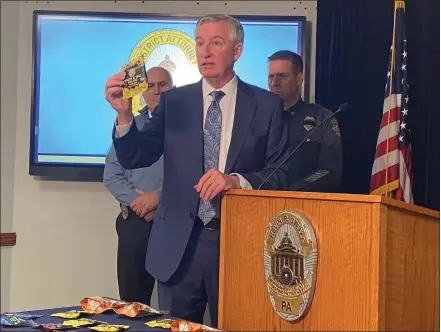  ?? CARL HESSLER JR. — MEDIANEWS GROUP ?? Montgomery County District Attorney Kevin Steele displays a package of CBD gummies found to contain fentanyl.