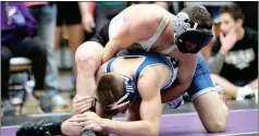  ??  ?? Rockmart’s Truett Bowman grapples with his opponent at the Darlington Classic on Jan. 20.