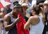  ?? FRANK GUNN — THE ASSOCIATED PRESS ?? Bianca Andreescu consoles Serena Williams after Williams had to retire from the final of the Rogers Cup tournament in Toronto on Aug. 11.