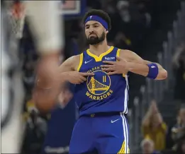  ?? TONY AVELAR — THE ASSOCIATED PRESS ?? The Warriors’ Klay Thompson, who had 30points, reacts after making a one of his eight 3-pointers against the Grizzlies in Game 6of the Western Conference playoff semifinals.