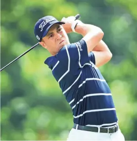  ?? ANDREW REDINGTON/GETTY IMAGES ?? Justin Thomas shot 7-under-par 65 Thursday at Medinah Country Club in the first round of the BMW Championsh­ip.