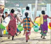  ?? PTI ?? People rush to fill their vessels from a water tanker following acute water shortage, in Chennai on June 22, 2019.