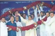  ?? PTI PHOTO ?? Bahujan Samaj Party chief Mayawati is garlanded at a mega rally in Azamgarh on Sunday.