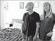  ?? BRYNN ANDERSON/AP ?? Mitch and Annika Dworet speak in their son Nick’s bedroom before the anniversar­y of the Parkland massacre.