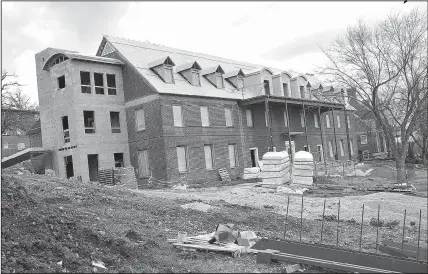  ?? NWA Democrat-Gazette/ MICHAEL WOODS @NWAMICHAEL­W ?? The Lambda Chi Alpha Fraternity house (above photo) at 120 Stadium Drive, shown March 3, is undergoing renovation­s. The new Kappa Alpha House (right photo) on Arkansas Avenue in Fayettevil­le is expected to be ready for students for the fall of 2016.