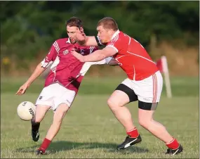  ??  ?? Two somewhat mature warriors of Wicklow GAA clashed last Thursday evening in Stratford. Stratford-Grangecon’s James ‘Shanks’ Whelan and Tinahely’s David Dillon went toe to toe in the Junior ‘C’ football championsh­ip clash.