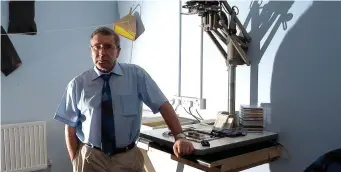  ??  ?? The late Mr Finn had a keen interest in photograph­y and is pictured here in the darkroom of The Sligo Champion at Finisklin in 2005. Pic: Carl Brennan.