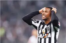  ?? — AFP file photo ?? Robinho reacts during a match.