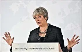 ?? AP/MAURIZIO DEGL’INNOCENTI ?? British Prime Minister Theresa May speaks in Florence, Italy, on Friday.