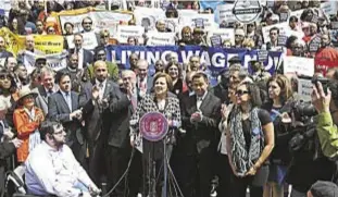  ?? Photo by Bryan Pace ?? City Council Speaker Christine Quinn speaks as elected officials, labor unions and community activists rallied recently on the steps of City Hall on the Living Wage bill vote.