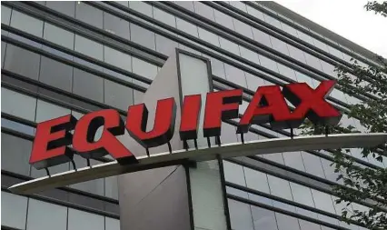  ?? Mike Stewart / AP ?? Equifax said last Monday that an additional 2.5 million Americans may have been affected by the massive security breach of its systems, bringing the total to 145.5 million people.