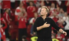  ?? Photograph: Jonathan Nackstrand/AP ?? Kasper Hjulmand celebrates with the Parken crowd after the 4-1 win against Russia.