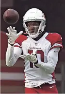  ?? KYLE TERADA/USA TODAY SPORTS ?? DeAndre Hopkins had 14 catches for 151 yards in his first game with the Cardinals.