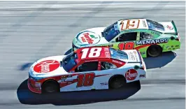  ?? Associated Press ?? ■ Ryan Preece (18) leads Brandon Jones (19) during a NASCAR Xfinity Series auto race on Saturday in Bristol, Tenn.