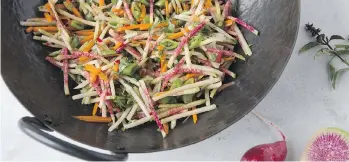  ??  ?? Radish and pea slaw will add a touch of colour to your dining room table.