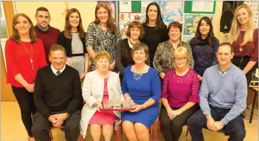  ?? Front, from left:
Muiris Ó hAoire (Board of Management), Breda O’Dwyer (Principal), Norma O’Carroll, Rita Goulding and Maurice O’Connor. ?? Teachers and Board of Management at Sliabh a’Mhadra wishing Norma O’Carroll all the best on her retirement after 32 years’ service. Back, from left:
Mary Wallace, Cathal White, Sinead Pierse, Sarah Ross, Majella Egan, Denise Wren, Anne White (Sec),...