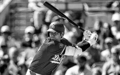  ?? USA TODAY SPORTS ?? Los Angeles Dodgers designated hitter Shohei Ohtani against the Seattle Mariners during a spring training game at Camelback Ranch on March 13.