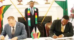  ?? ?? The President witnesses the signing of a Memorandum of Understand­ing between Home Affairs and Cultural Heritage Minister Kazembe Kazembe (right) and Belarus Minister of Internal Affairs Ivan Kubrakov at State House yesterday. (Story on Page 2)