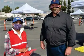  ?? RECORDER PHOTO BY ALEXIS ESPINOZA ?? On Wednesday, Arlina Gillett (left) volunteere­d her time to help at the PC vaccinatio­n site after reaching out to Tulare County Supervisor Dennis Townsend (right) to see how she and some of her colleagues could assist at the POD.