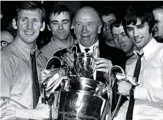  ??  ?? Champions: Crerand, left, with Matt Busby and George Best after the team’s European Cup victory in 1968