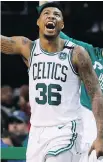  ?? MICHAEL DWYER/AP ?? Marcus Smart has helped set the tone for a Boston Celtics team that has outworked the Cleveland Cavaliers.