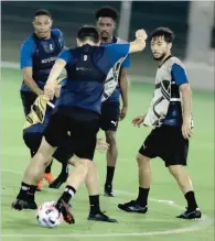  ??  ?? Al Sadd players during a training session on Thursday.