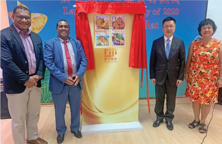  ?? Photo: Fonua Talei ?? Four new zodiac stamps commemorat­ing this year’s Chinese New Year celebratio­ns were launched by the Chinese Cultural Centre in Fiji and Post Fiji Limited. From left: Post Fiji Head of Retail and Marketing Isaac Mow, Assistant Minister for Education, Heritage and Arts Joseph Nand, China’s Ambassador to Fiji Qian Bo and Head of the Chinese Associatio­n Jenny Seeto at the China’s Cultural Centre in Suva on January 17, 2020.