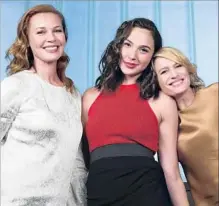  ?? Allen J. Schaben Los Angeles Times ?? CONNIE NIELSEN, left, Gal Gadot and Robin Wright say an easy bond developed among the three during filming.