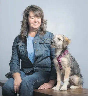  ?? MICHAEL BELL ?? Barbara Lloyd with her dog, Dori. Lloyd is dog behaviouri­st and certified trainer.