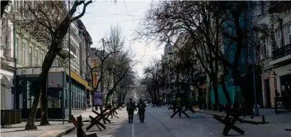  ?? AFP ?? Las calles de Odesa se llenaron de barricadas.